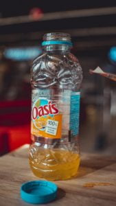 blue and yellow labeled plastic bottle